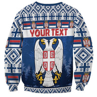 Blue crewneck sweatshirt with crest and 'YOURTEXT' across front, eagle graphic