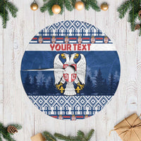 Round blue Christmas tree skirt with Serbia coat of arms crest and white fringe edge