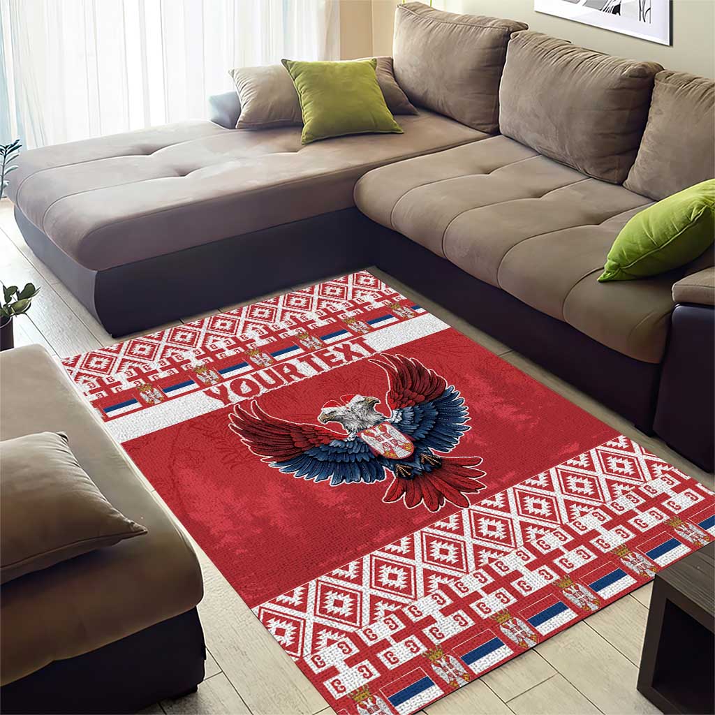 Red area rug with double-headed eagle motif and patterned border; "YOUR TEXT"