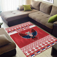 Red area rug with double-headed eagle motif and patterned border; "YOUR TEXT"