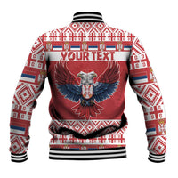 Red baseball jacket back with double-headed eagle crest, festive banded trim and ribbed cuffs