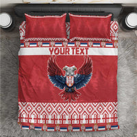 Red bedding set with eagle graphic, white stripe band, and patterned border; includes pillowcases