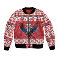 Red bomber jacket with ribbed collar, front zipper, eagle center graphic and holiday pattern