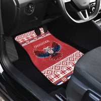 Red rear car floor mat with double-headed eagle emblem and geometric border pattern