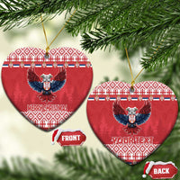 Two red round ceramic ornaments: front and back, with double-headed eagle and Merry Christmas