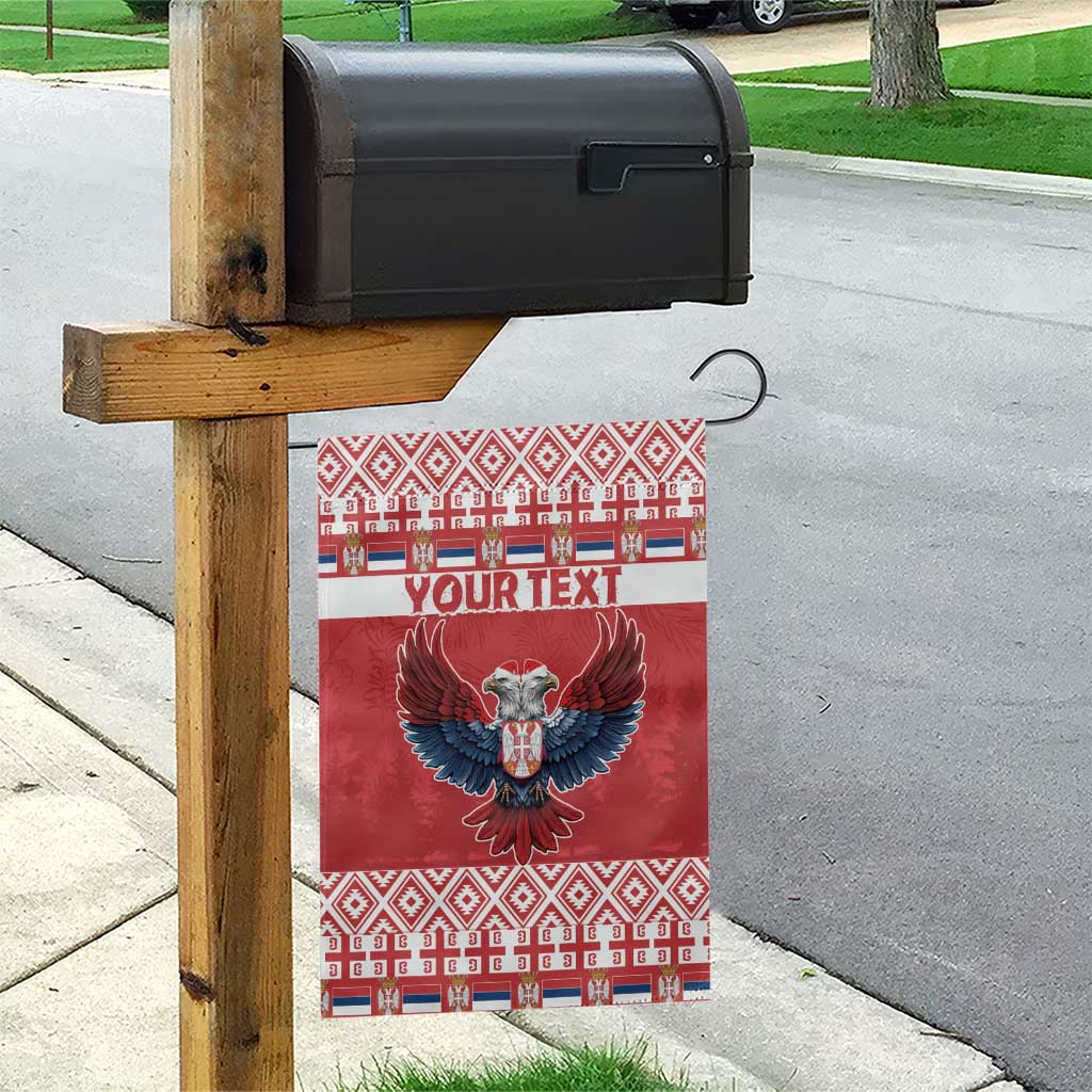 Red flag on wooden post with double-headed eagle art and 'YOUR TEXT' banner strip