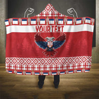 Red hooded blanket with 'YOUR TEXT' across chest and eagle crest, full wrap