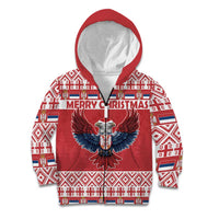 Red kids pullover hoodie with hood, “MERRY CHRISTMAS” text, and eagle emblem.