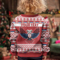 Kids red Christmas sweater back with "YOUR TEXT" eagle graphic and geometric borders