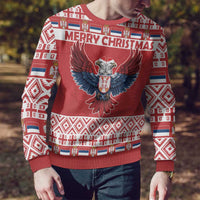 Red Christmas sweater with double-headed eagle center and white-blue border knit pattern