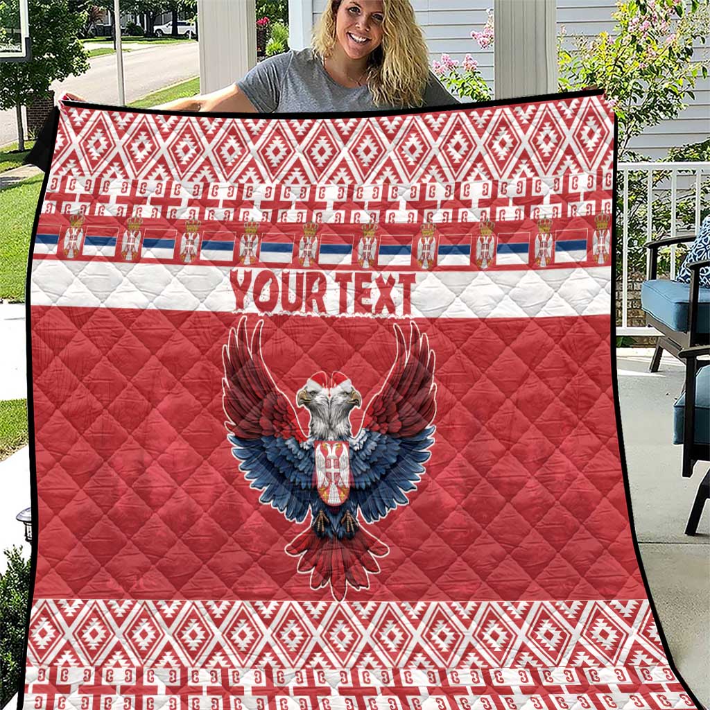 Red quilt with white stripe, double-headed eagle emblem, 'YOUR TEXT', geometric border