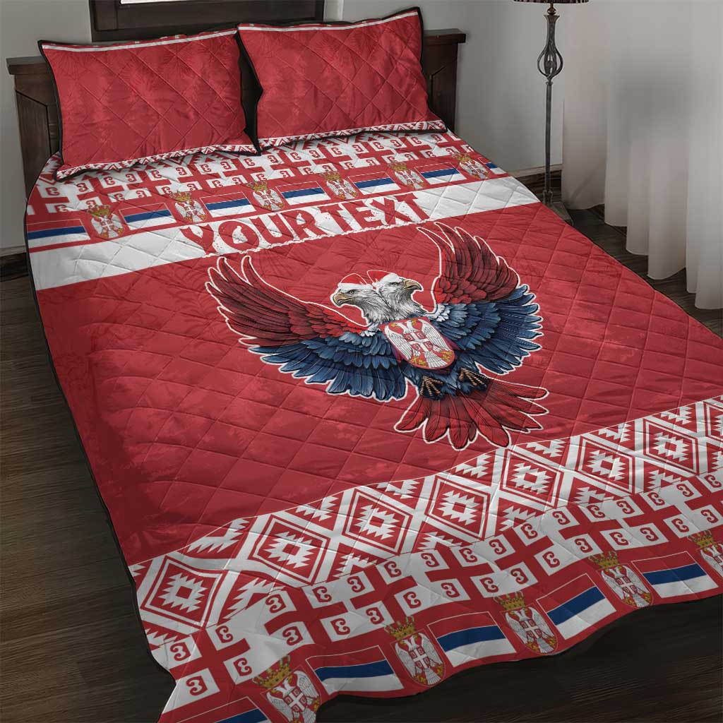 Red quilt bed set featuring double-headed eagle, patterned trim, includes two pillowcases
