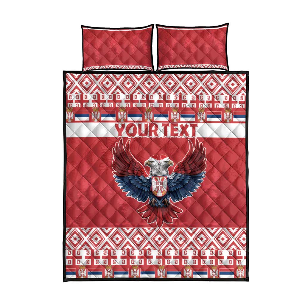Red quilt bed set front view with eagle emblem, white-blue stripe, patterned borders