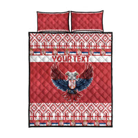 Red quilt bed set front view with eagle emblem, white-blue stripe, patterned borders