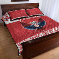 Red quilt bed set with eagle motif and patterned hem, two matching pillows