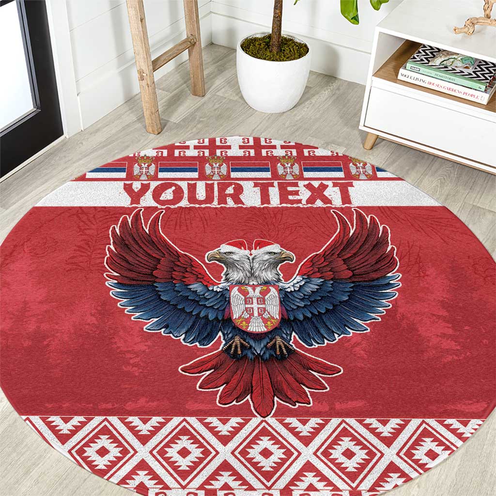 Red round Christmas carpet rug with double-headed eagle graphic and geometric border