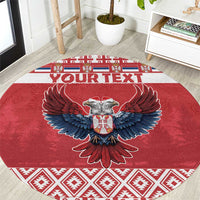 Red round Christmas carpet rug with double-headed eagle graphic and geometric border