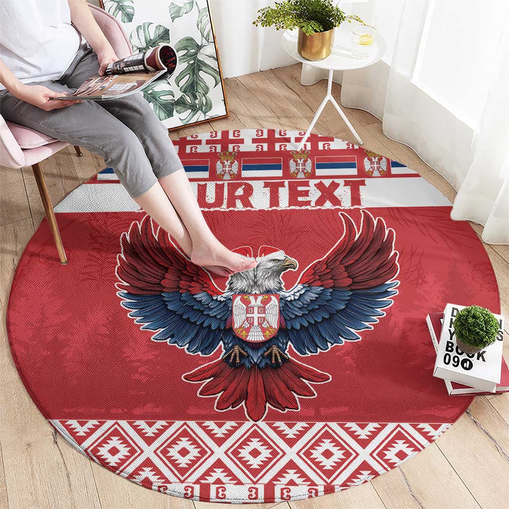 Red round Christmas carpet with eagle emblem and 'YOUR TEXT' banner across center