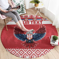Red round Christmas carpet with eagle emblem and 'YOUR TEXT' banner across center