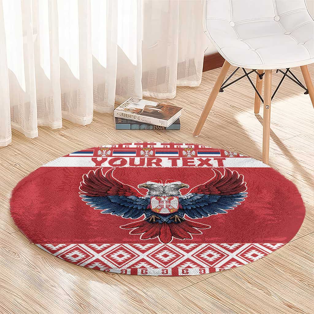 Red round Christmas carpet rug with eagle emblem and white/red patterned edge