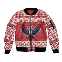 Red zip-up bomber jacket with bold eagle graphic, patterned sleeves, ribbed cuffs and hem