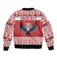 Red bomber jacket back with eagle emblem, white festive border, ribbed collar, zipper