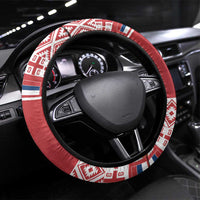 Red steering wheel cover with black rim and festive geometric band