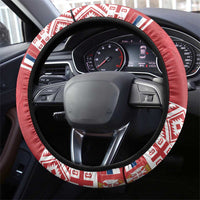 Red steering wheel cover with geometric patterned outer band and black inner grip