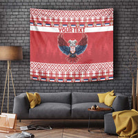 Red Christmas tapestry with eagle emblem and festive patterned border, personalized text area