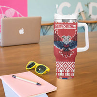 Red Christmas tumbler with handle, double-headed eagle and 'MERRY CHRISTMAS' text