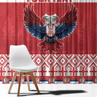 Red curtain with large double-headed eagle emblem and decorative border strip at bottom