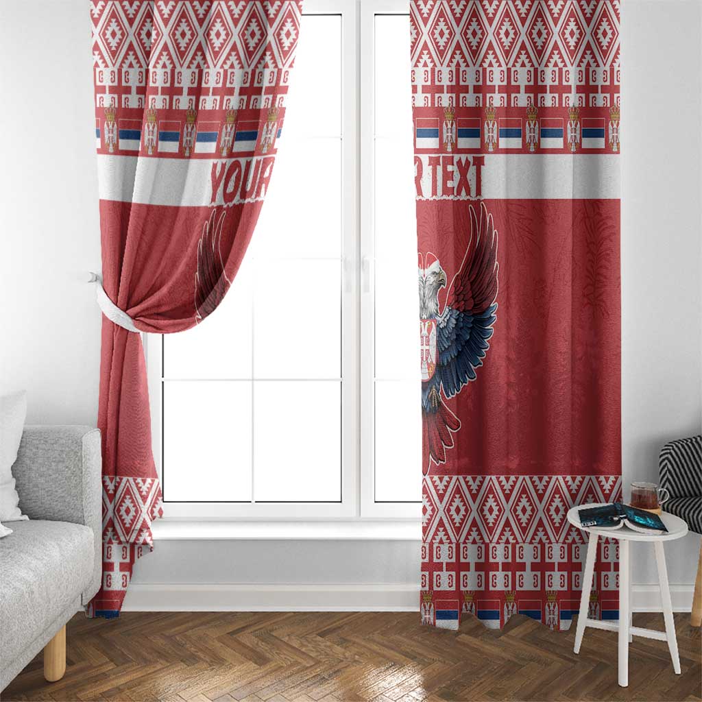 Red window curtain pair with double-headed eagle motif and geometric patterned hem
