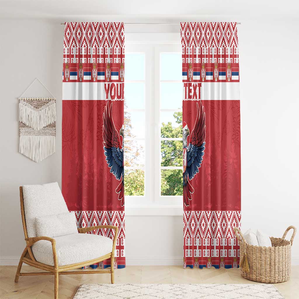 Red window curtains with double-headed eagle artwork and patterned stripe border
