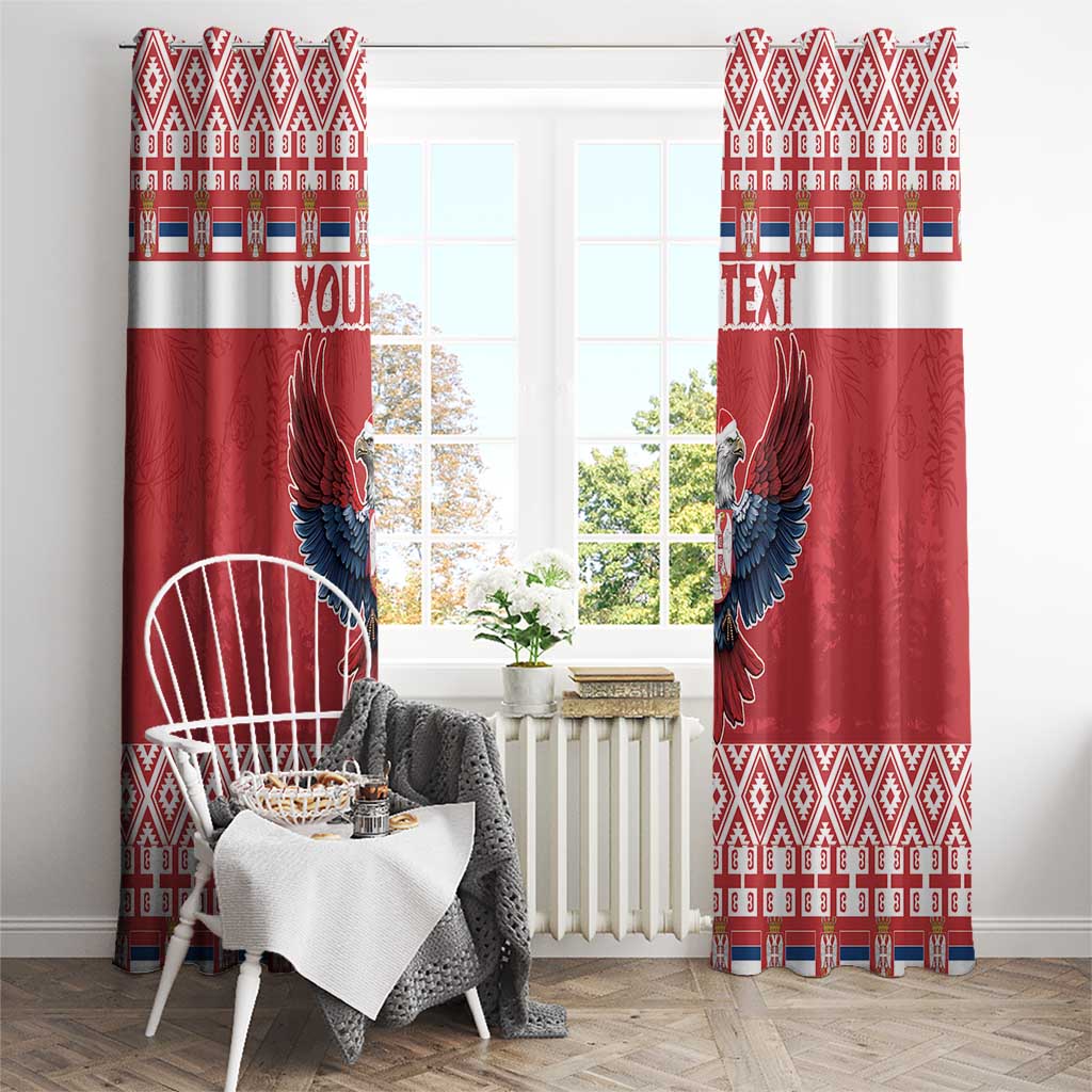 Red curtain panels with double-headed eagle motif and repeating geometric trim band