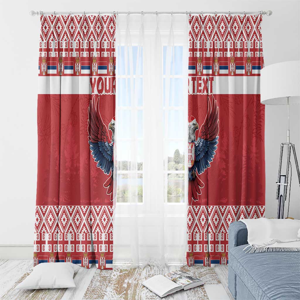 Red window curtain pair with double-headed eagle design and geometric patterned hem