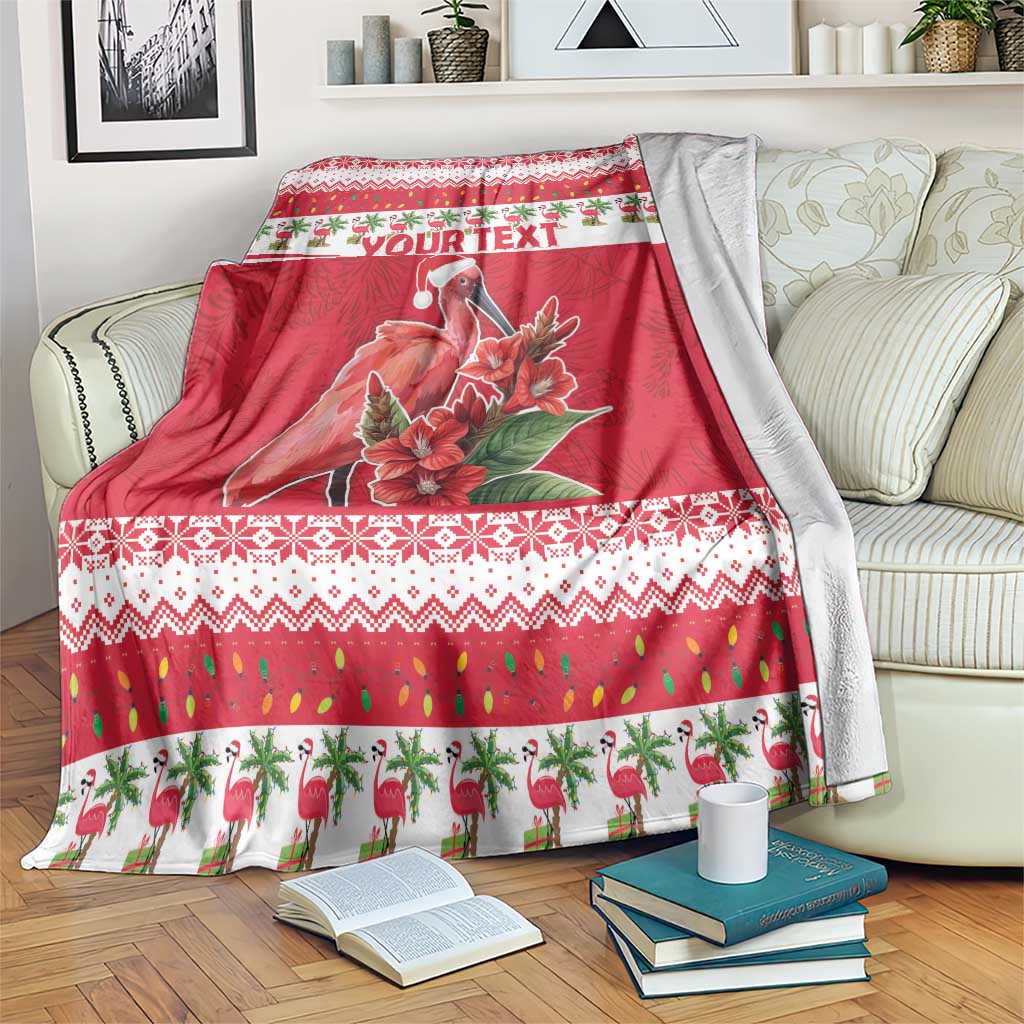 Red Christmas throw blanket with flamingo, flowers, and 'YOUR TEXT' strip