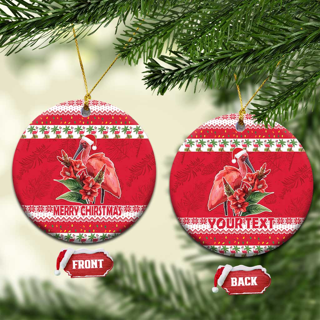 Scarlet round ceramic Christmas ornament with flamingo and flowers, front and back shown