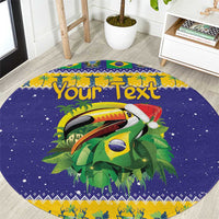 Round blue Christmas rug with toucan, leaves, and customizable text over festive border.