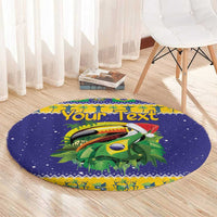 Round blue Christmas rug with toucan and tropical leaves design plus custom text.