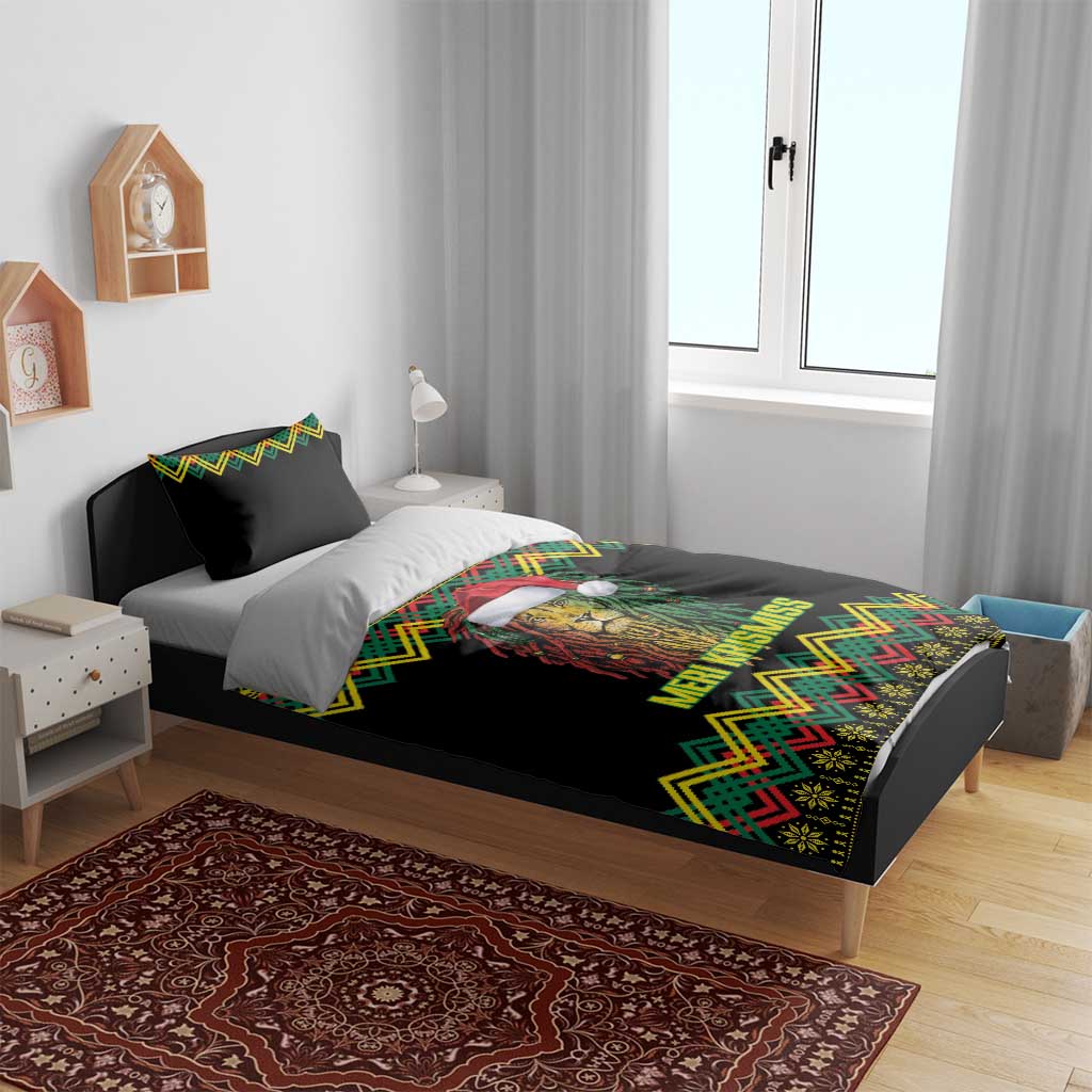 Black Christmas bedding set on bed with lion Santa hat graphic and “MERI KRISMISS” kente pattern edges
