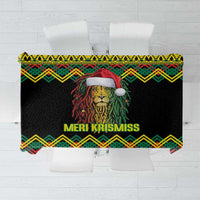 Black Christmas tablecloth with lion face, 'MERI KRISMISS' text, and kente zigzag trim