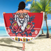 Red round beach blanket with fringed edge, lynx with Santa hat and floral border