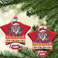 Red star-shaped ceramic Christmas ornament with Eurasian lynx in Santa hat and peony flowers; front/back