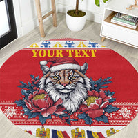 Personalized round Christmas rug, red with lynx face, peony flowers, and 'Your Text' arc
