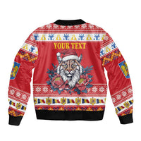 Back features YOUR TEXT and a printed lynx face, red festive pattern, black ribbed cuffs.