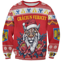 Red crewneck sweatshirt with holiday lynx graphic, floral accents, and patterned trim
