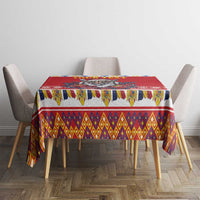 Red Christmas tablecloth with patterned band and multicolor diamond strip