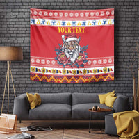 Red Christmas tapestry with Eurasian lynx in Santa hat, peony flowers, and patterned border