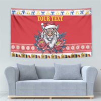 Red Christmas tapestry with Eurasian lynx in Santa hat, peony blooms, and “YOUR TEXT” title