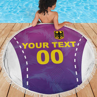 Round purple beach blanket with white fringe, YOUR TEXT and 00 football-style graphic